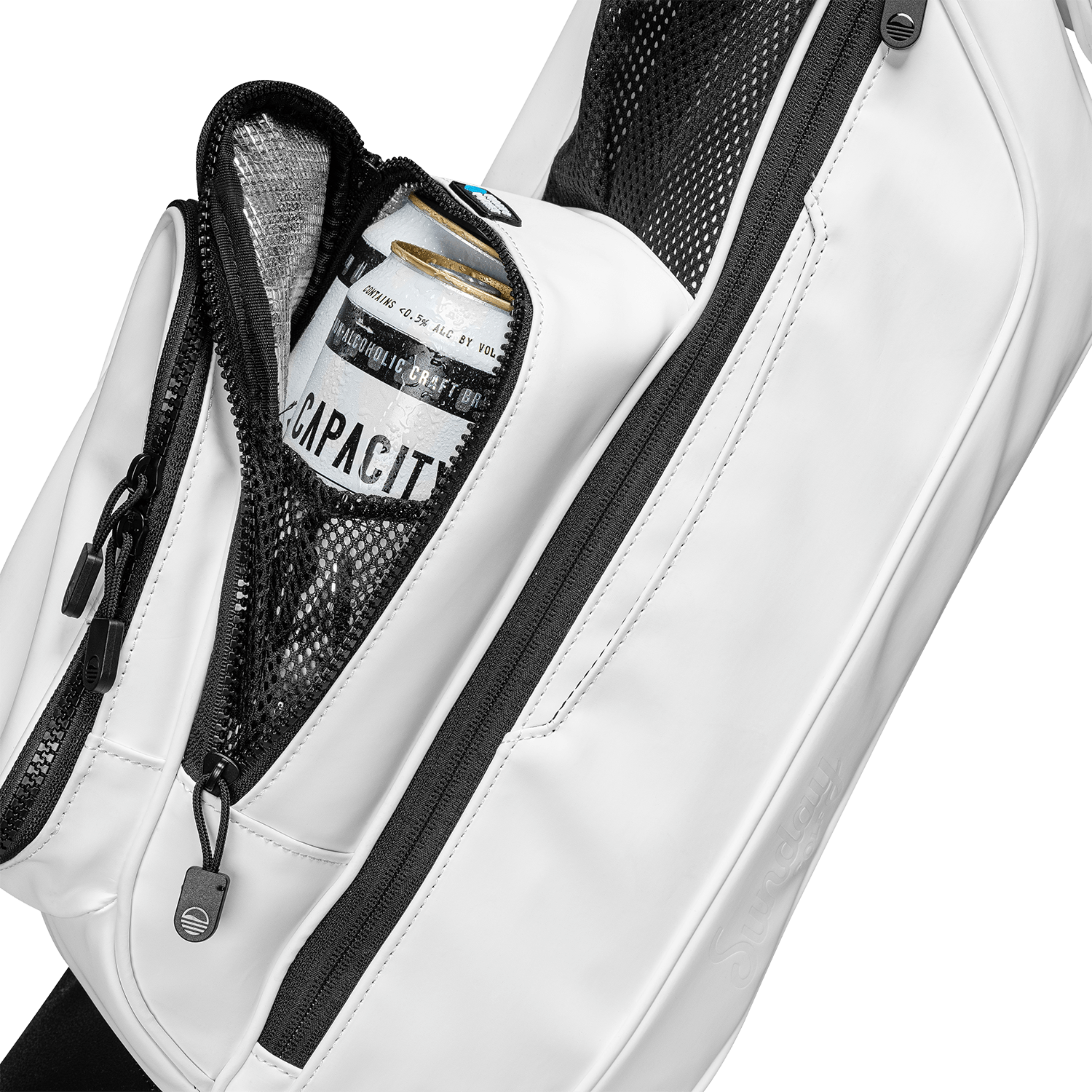 Loma in white vegan leather close up shot of the frosty pocket with 2 cans inside
