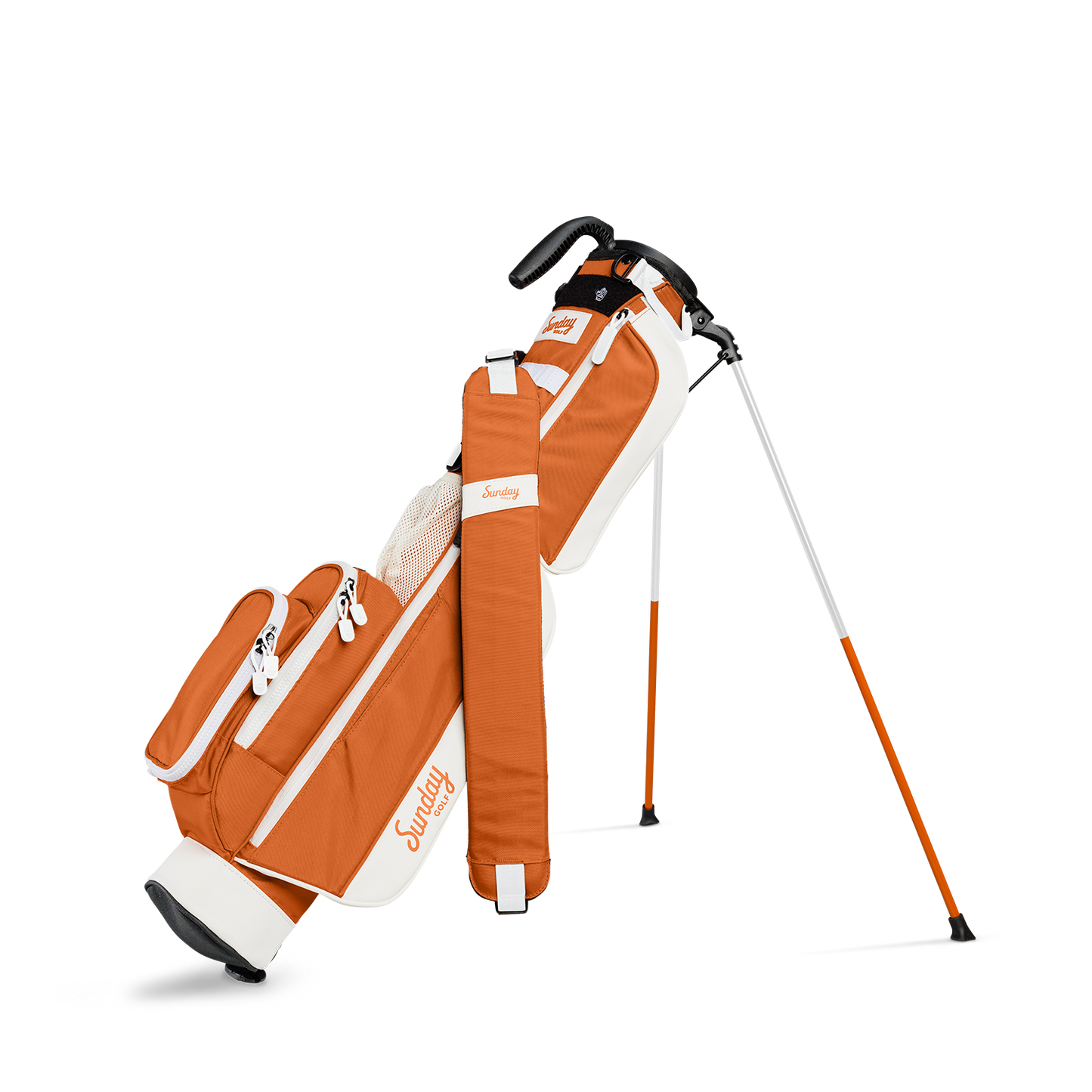 A full front shot of standing Loma golf bag in burnt orange with single strap