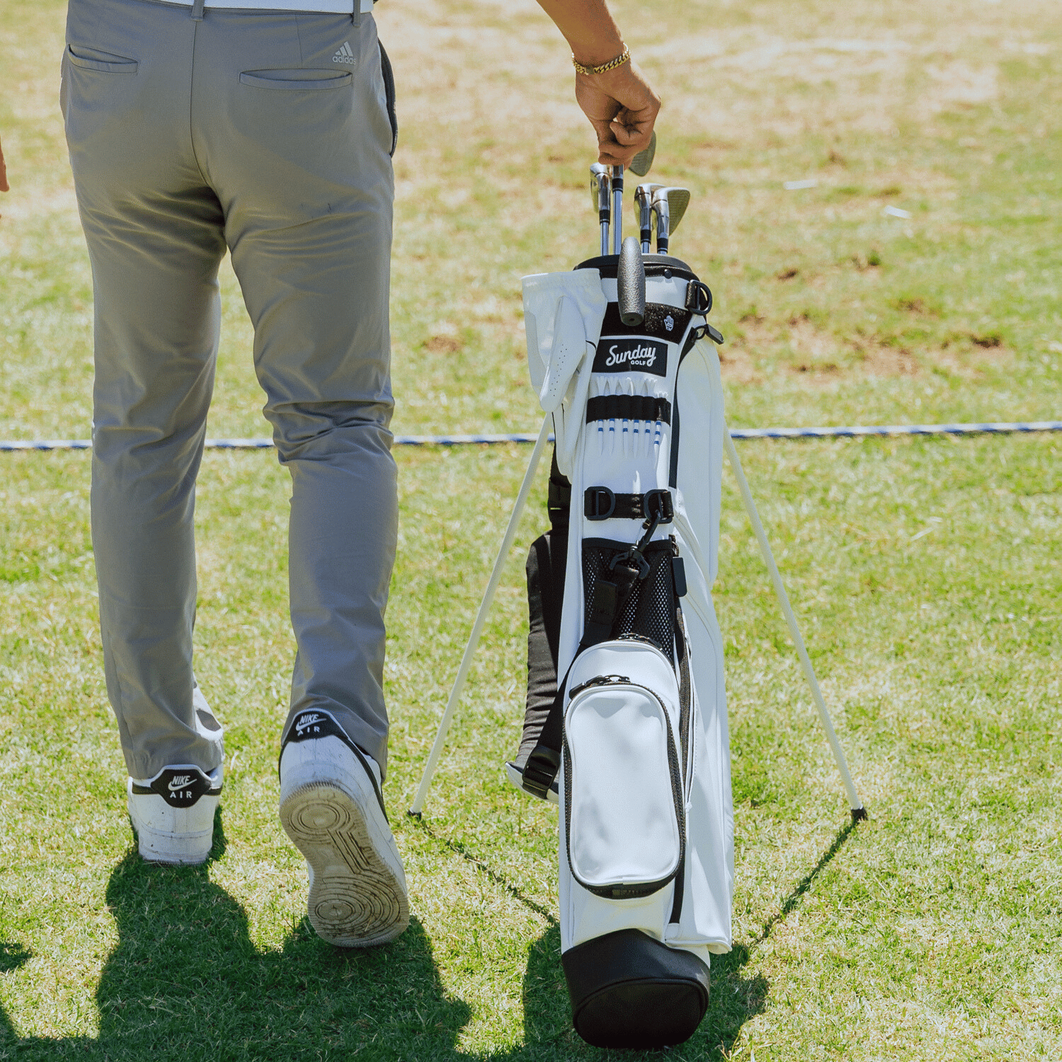 Loma White S Class on course with some clubs on it showing the full front view