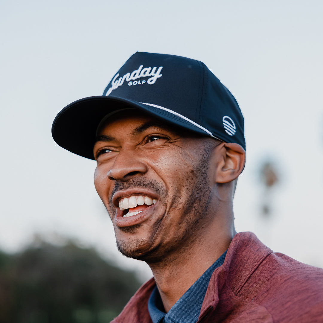 man wearing navy rope hat by Sunday Golf