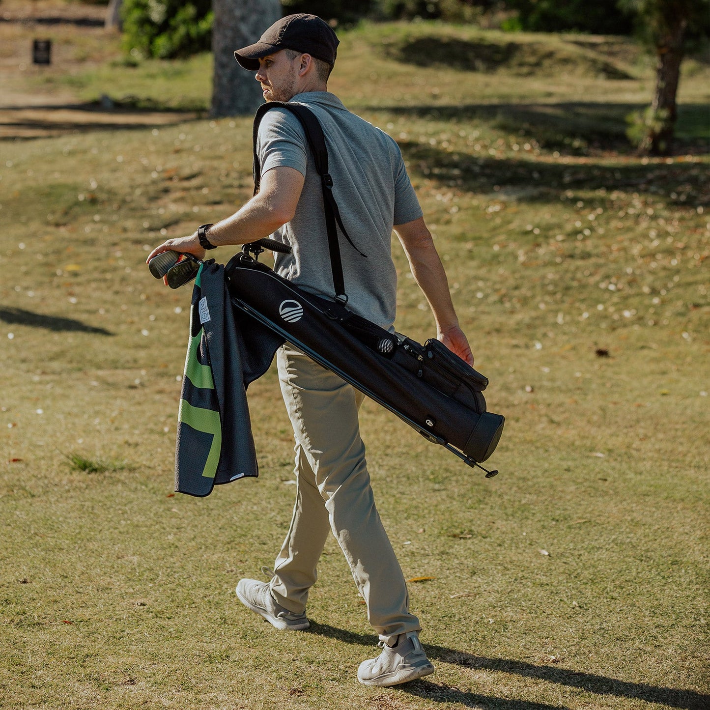 Man carrying Matte Black Loma Bag