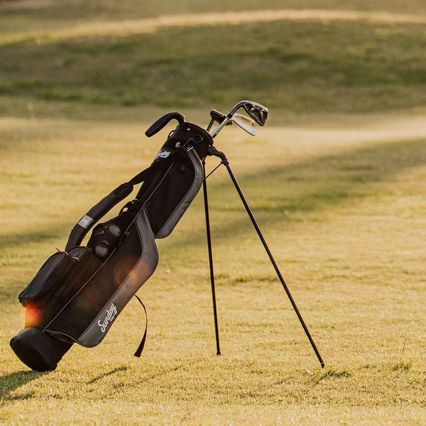 Matte Black Loma Bag on golf course