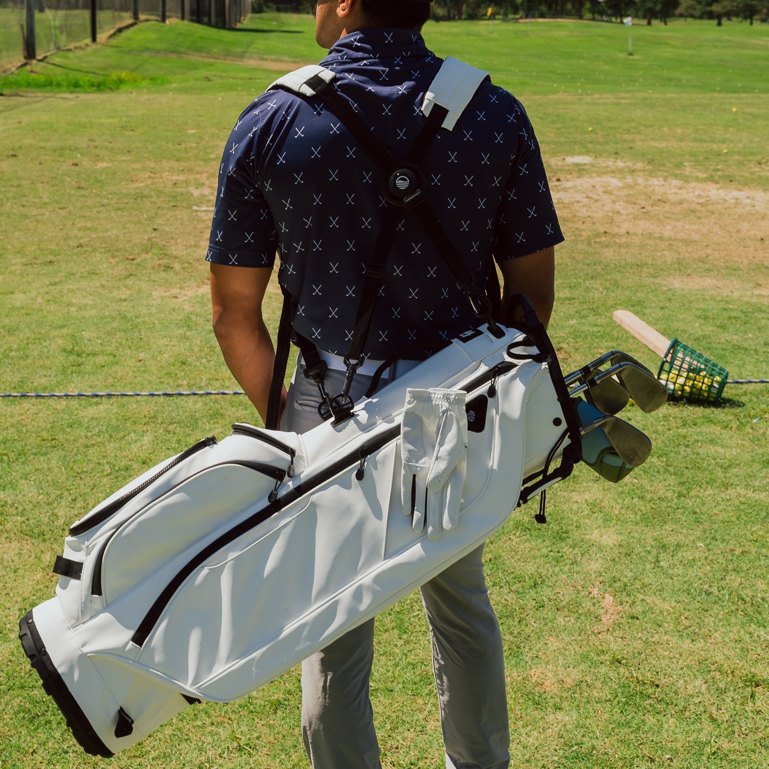 Back view of a man wearing the Ryder White S Class, highlighting the bag and the double straps