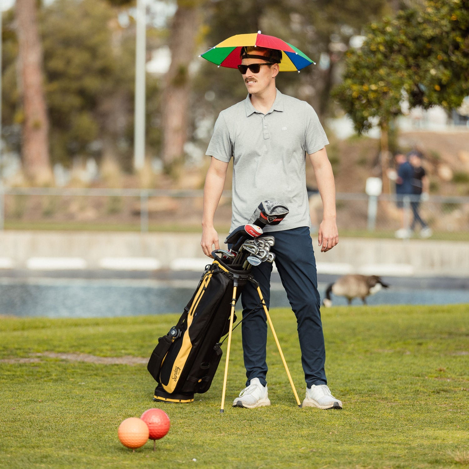 El camino black and yellow on green lifestyle photo