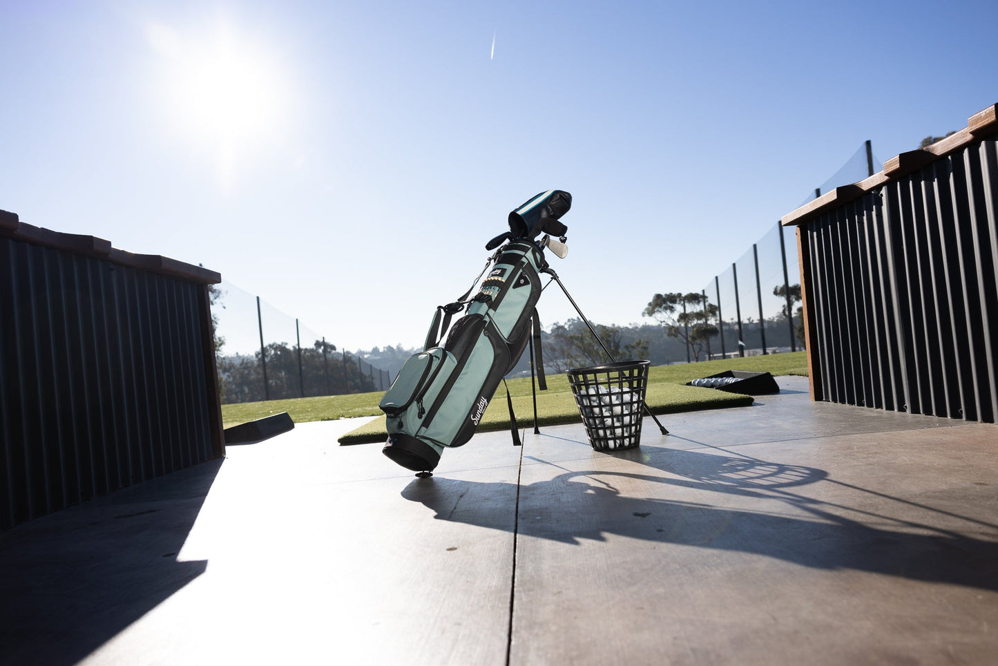 Seafoam Loma XL golf bag by Sunday Golf at the driving range