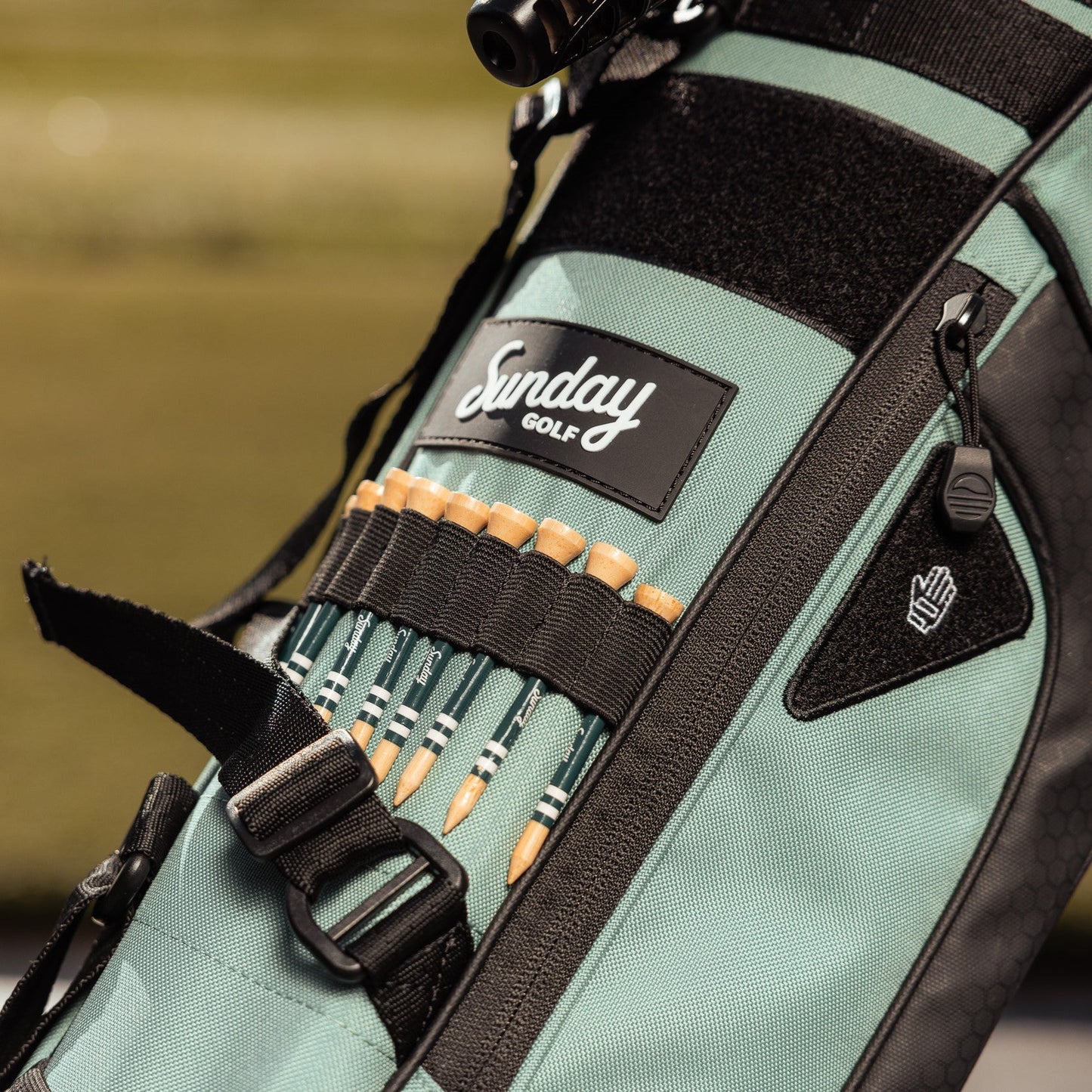 golf tees on seafoam sunday golf bag
