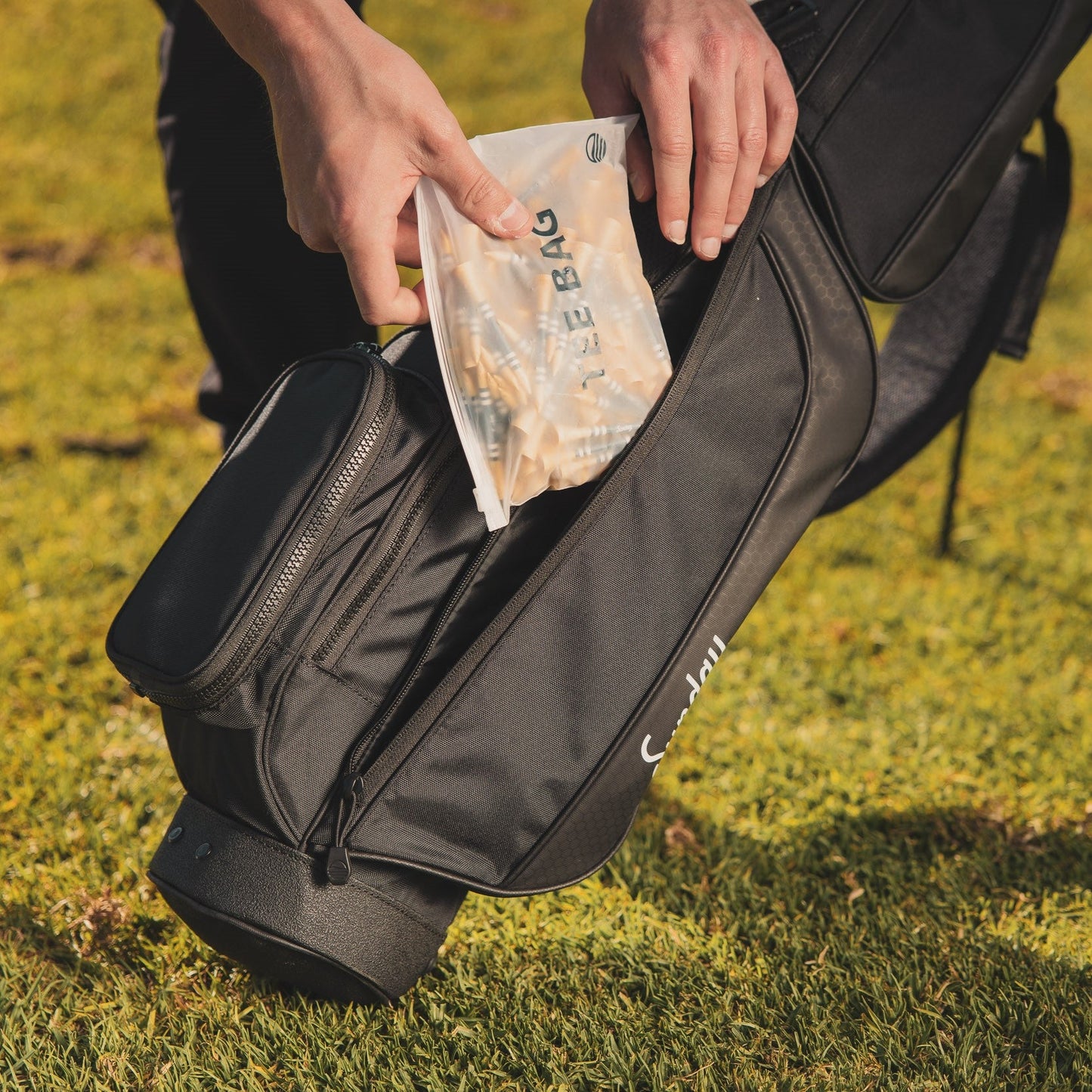 golf tees in bag pocket