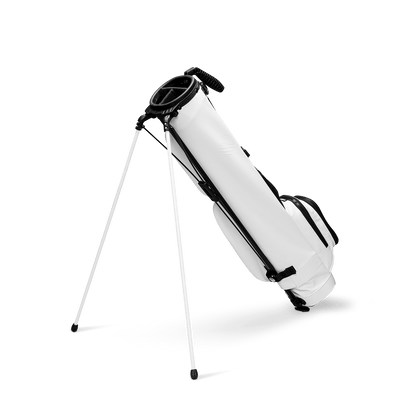 Loma XL in white vegan leather back shot showing the stand
