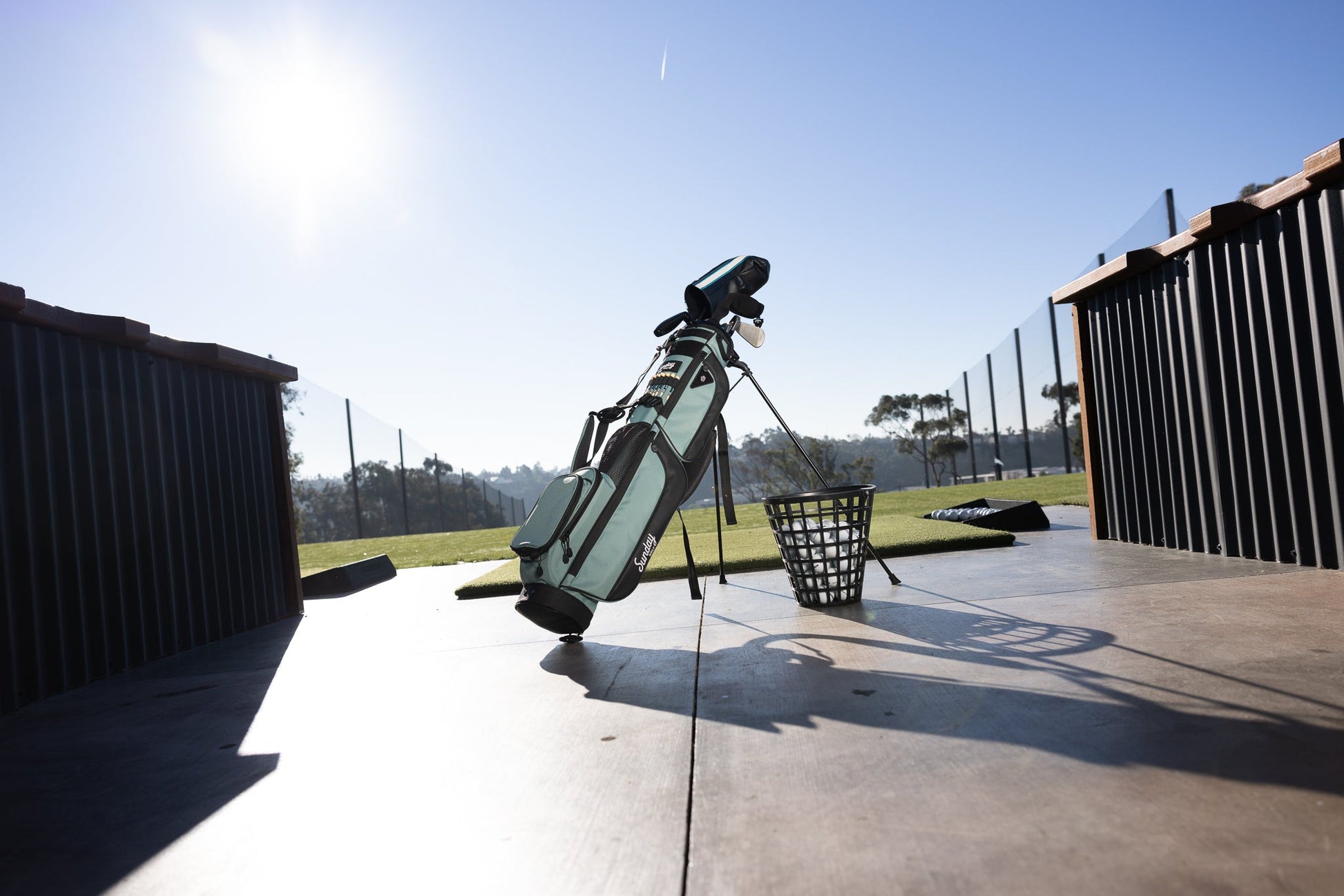 Seafoam Loma XL golf bag by Sunday Golf at the driving range 