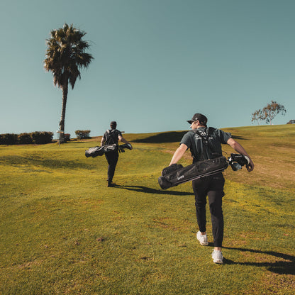 two men carrying Loma XL Bags by Sunday Golf on the golf course